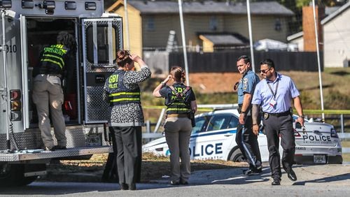 Gwinnett County police were on the scene in the 5000 block of Singleton Road where a man was shot and killed Friday.