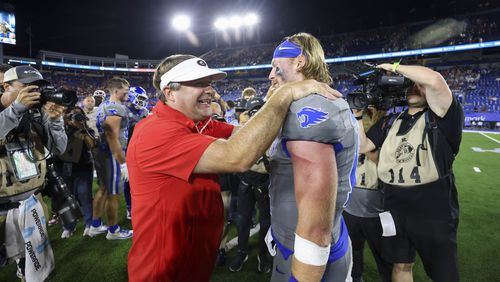 Georgia head coach Kirby Smart talks with Kentucky quarterback Brock Vandagriff (12) after their game at Kroger Field, Saturday, Sept. 14, 2024, in Lexington, Kentucky. Georgia won 13-12. (Jason Getz / AJC)

