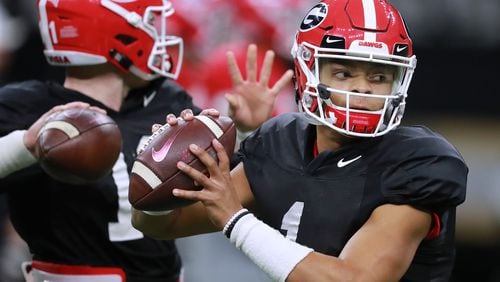Quarterbacks Justin Fields (right) and Jake Fromm work out during a Georgia practice in 2018.  Fields has transferred to Ohio State.