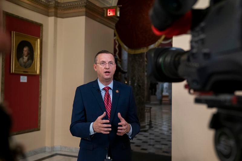 Rep. Doug Collins, R-Georgia, the top Republican on the House Judiciary Committee, does a tv news interview just outside the House chamber, Friday, Jan. 10, 2020, at the Capitol in Washington. Speaker of the House Nancy Pelosi, D-Calif., has not yet relayed the articles of impeachment to the Senate for trial three weeks since President Donald Trump was impeached on charges of abuse and obstruction. (AP Photo/J. Scott Applewhite)