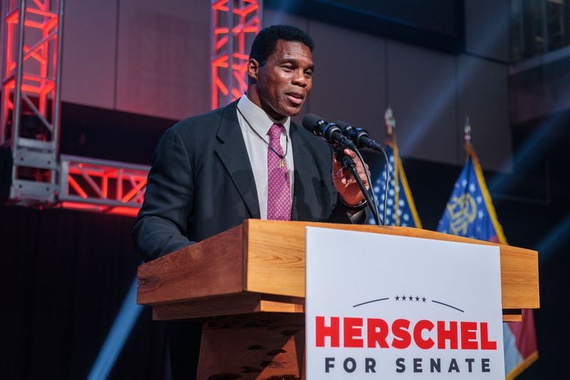 When Republican Herschel Walker waged a challenge against Raphael Warnock in 2022, the Democratic senator distanced himself from President Joe Biden and his low approval rating in the state. Warnock said voters were more interested in where Walker and he differed on pocketbook issues. (Arvin Temkar/The Atlanta Journal-Constitution/TNS)