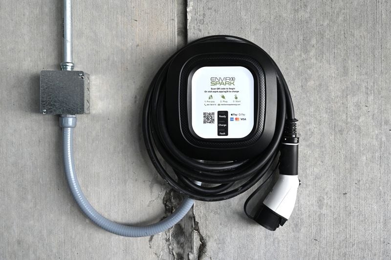 40 amp EV chargers were being installed at the parking deck of Reserve at LaVista Walk apartments, Friday, June 23, 2023, in Atlanta. (Hyosub Shin / Hyosub.Shin@ajc.com)