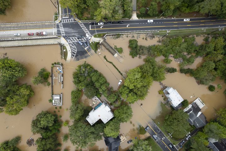 Peachtree Creek spills over its banks in Atlanta on Friday, Sept. 27, 2024 following a night of heavy rain from Hurricane Helene. Northside Drive NW is seen at the top of the photo. Ben Gray for the Atlanta Journal-Constitution