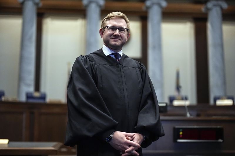 During his successful run for reelection, state Supreme Court Justice Andrew Pinson stressed that Georgians did not want a politicized judiciary. Helping him win was the support of Gov. Brian Kemp — including a $500,000 ad buy funded by the governor's political organization — and other conservative groups. (AP Photo/Mike Stewart, File)