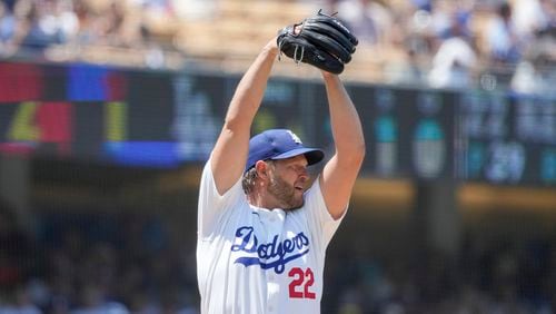 Los Angeles Dodgers starting pitcher Clayton Kershaw (22) winds up during the third inning of a baseball game against the San Francisco Giants in Los Angeles, Calif., Thursday, July 25, 2024. (AP Photo/Eric Thayer)