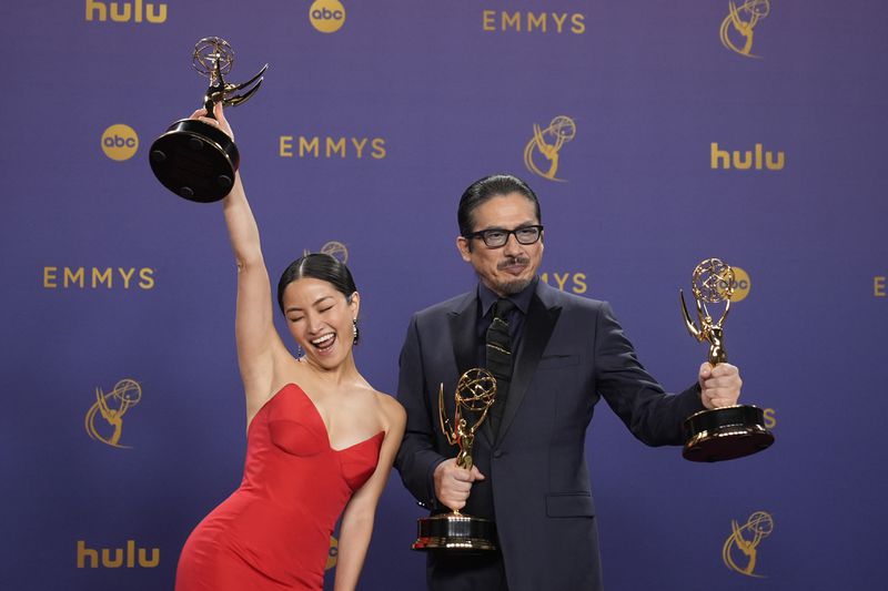 Anna Sawai, left, winner of the award for outstanding lead actress in a drama series for "Shogun", and Hiroyuki Sanada, winner of the awards for outstanding lead actor in a drama series, and outstanding drama series for "Shogun" pose in the press room during the 76th Primetime Emmy Awards on Sunday, Sept. 15, 2024, at the Peacock Theater in Los Angeles. (AP Photo/Jae C. Hong)