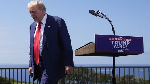 Republican presidential nominee former President Donald Trump leaves the podium after a news conference held at Trump National Golf Club Los Angeles in Rancho Palos Verdes, Calif., Friday, Sept. 13, 2024. (AP Photo/Jae C. Hong)