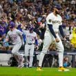 Milwaukee Brewers pitcher Devin Williams reacts after giving up a three-run home run to New York Mets' Pete Alonso during the ninth inning of Game 3 of a National League wild card baseball game Thursday, Oct. 3, 2024, in Milwaukee. (AP Photo/Morry Gash)