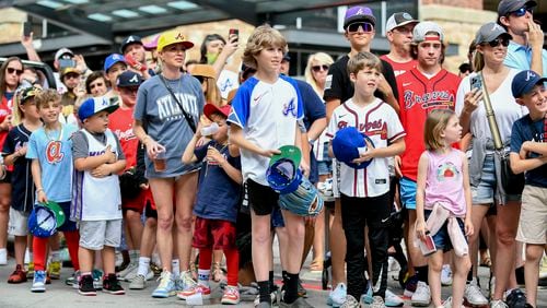 Braves fans wait for the players parade to start Thursday, April 6, 2023 at Truist Park in Atlanta. (Daniel Varnado / For the AJC)