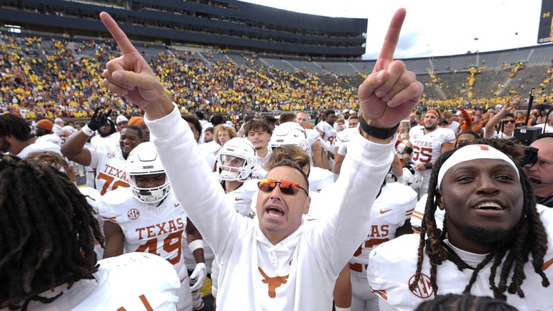 Texas head coach Steve Sarkisian celebrates after in beating Michigan 31-12 in an NCAA college football game in Ann Arbor, Mich., Saturday, Sept. 7, 2024. (AP Photo/Paul Sancya)