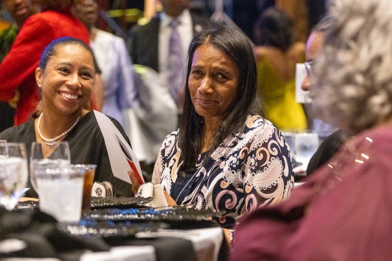 Linda Clonts (right) was one of 13 students who desegregated McEachern High School in Powder Springs, but dropped out within a few months because she felt so isolated. Last month, Clonts, shown here with daughter Mia Oberlton (left), was honored at the National Center for Civil and Human Rights Power to Inspire Awards event celebrating those who desegregated schools. (Arvin Temkar / arvin.temkar@ajc.com)