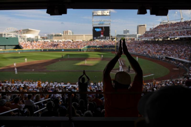 Tennessee fans applaud as a player comes to bat against Texas A&M during the first inning in Game 1 of the NCAA College World Series baseball finals in Omaha, Neb., Saturday, June 22, 2024. (AP Photo/Rebecca S. Gratz)