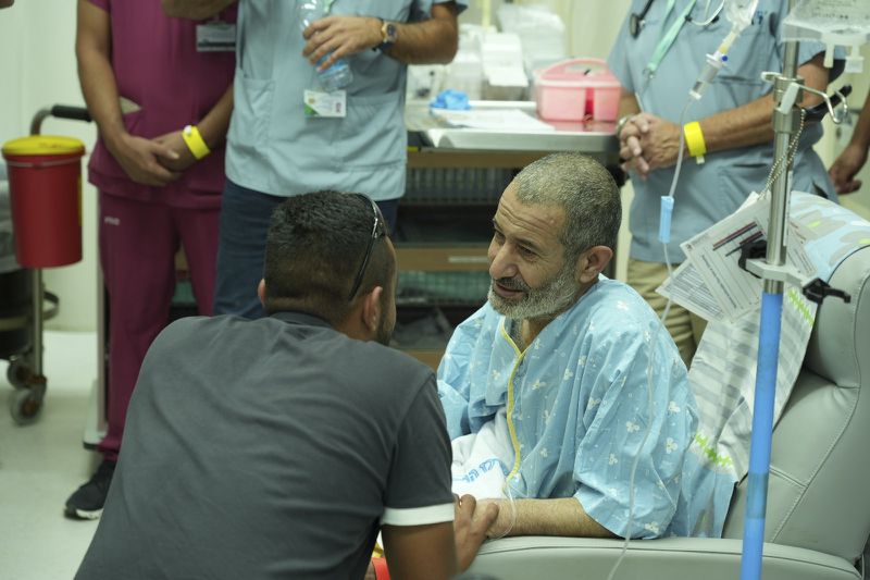 In this photo released by the Israel Prime Minister Office on Tuesday, Aug. 27, 2024, Kaid Farhan Al-Qadi, 52, who was held hostage by Hamas militants in Gaza sits in a room at the Soroka Medical Center in Beersheba, Israel. (Israel Prime Minister Office via AP)