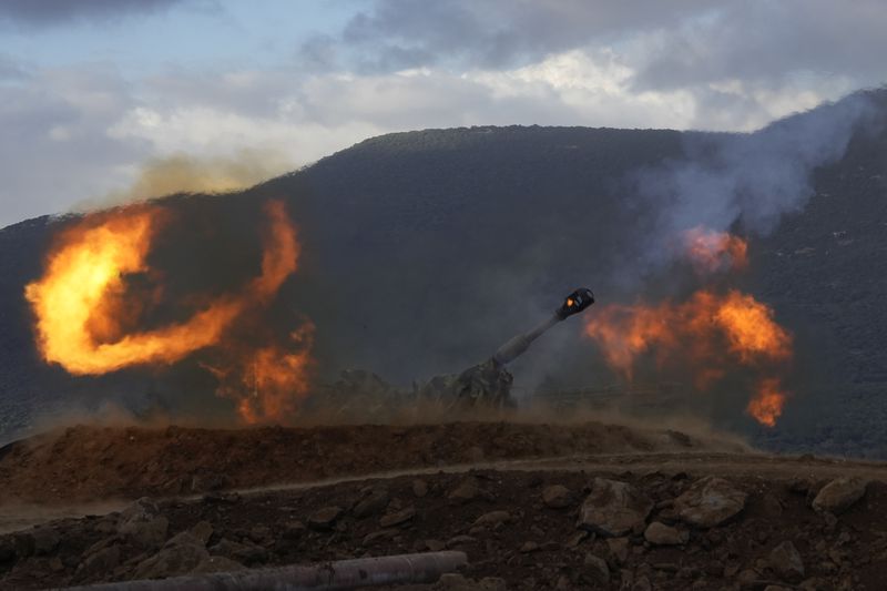 An Israeli mobile artillery unit fires a shell from northern Israel towards Lebanon, Wednesday, Oct. 2, 2024. (AP Photo/Baz Ratner)