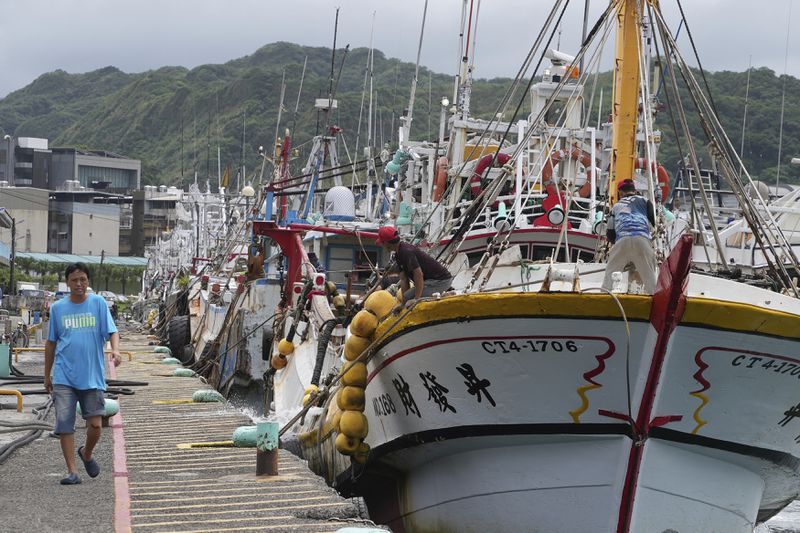 Boats are seen tightened with ropes before Typhoon Krathon arrives, at a harbor in Keelung, Taiwan, Monday, Sept. 30, 2024. (AP Photo/Johnson Lai)