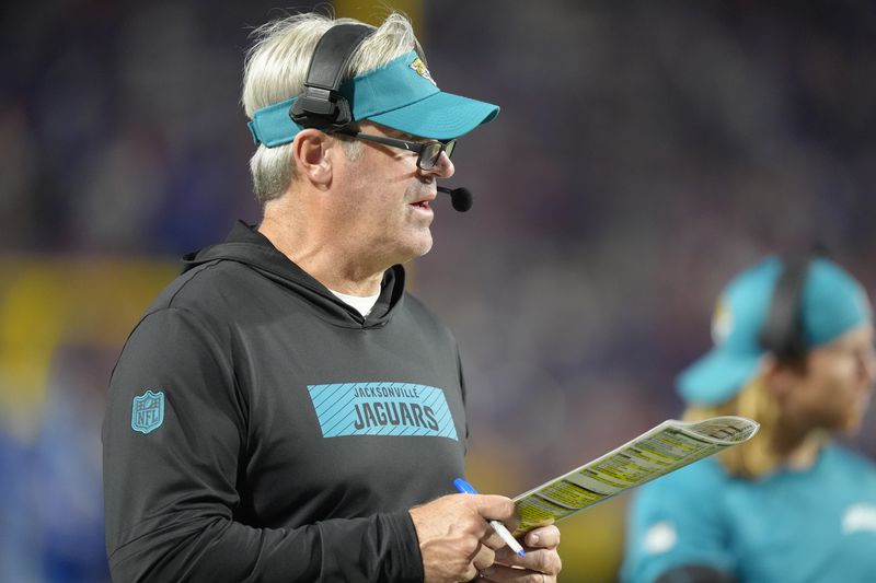 Jacksonville Jaguars head coach Doug Pederson watches from the sideline during the second half of an NFL football game against the Buffalo Bills, Monday, Sept. 23, 2024, in Orchard Park, NY. (AP Photo/Steven Senne)