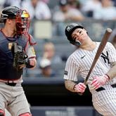 Sean Murphy (12) of the Atlanta Braves holds the ball as Alex Verdugo (24) of the New York Yankees reacts after striking out to end the fourth inning at Yankee Stadium on Sunday, June 23, 2024, in New York City. (Jim McIsaac/Getty Images/TNS)