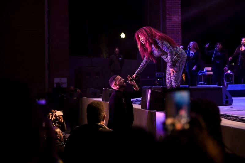 Chaka Khan interacts with a fan during her performance at the Stockbridge Amphitheater on Saturday, Oct. 23, 2021. (Daniel Varnado/ For the Atlanta Journal-Constitution)