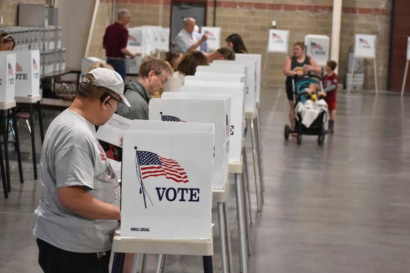 Voters cast ballots at the MetraPark events center, Tuesday, June 4, 2024, in Billings, Mont. The primary election included candidates for president, U.S. Senate, governor and other offices. (AP Photo/Matthew Brown)