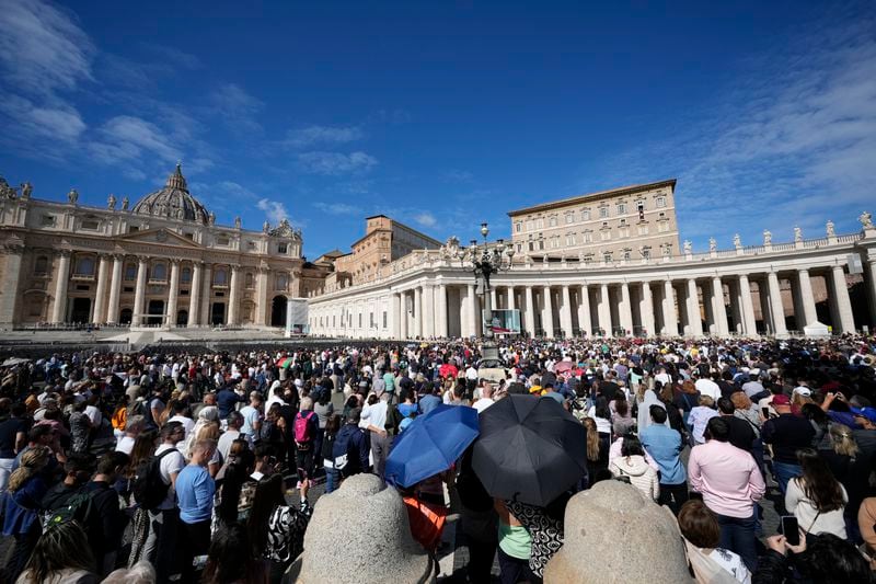 Pope Francis appears at the window of his studio for the traditional noon blessing of faithful and pilgrims gathered in St. Peter's Square at The Vatican, Thursday, Dec. 7, 2006. (AP Photo/Andrew Medichini)