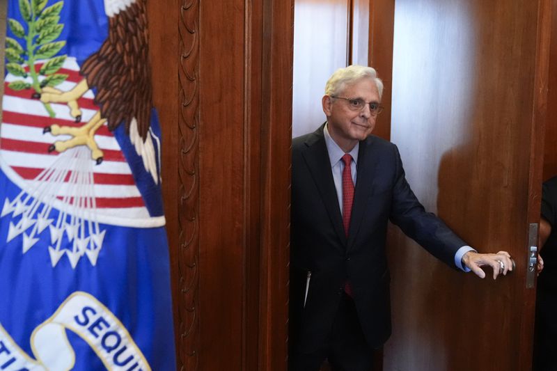 Attorney General Merrick Garland arrives for a meeting of the Justice Department's Election Threats Task Force at the Department of Justice, Wednesday, Sept. 4, 2024, in Washington. (AP Photo/Mark Schiefelbein)