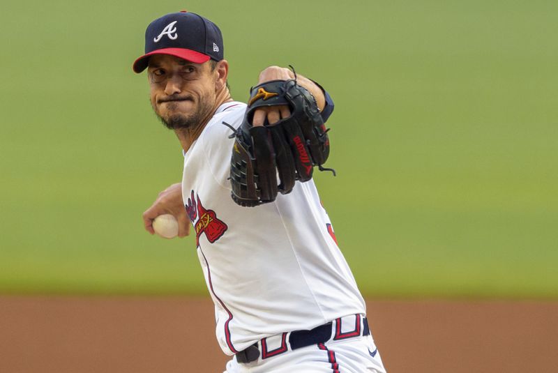 Atlanta Braves pitcher Charlie Morton throws in the first inning of a make-up baseball game against the Cincinnati Reds, Monday, Sept. 9, 2024, in Atlanta. (AP Photo/Jason Allen)