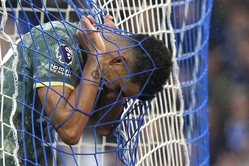 Tottenham Hotspur's Dominic Solanke rues a missed chance during the Premier League match at the American Express Stadium, Brighton, England, Sunday Oct. 6, 2024. (Gareth Fuller/PA via AP)