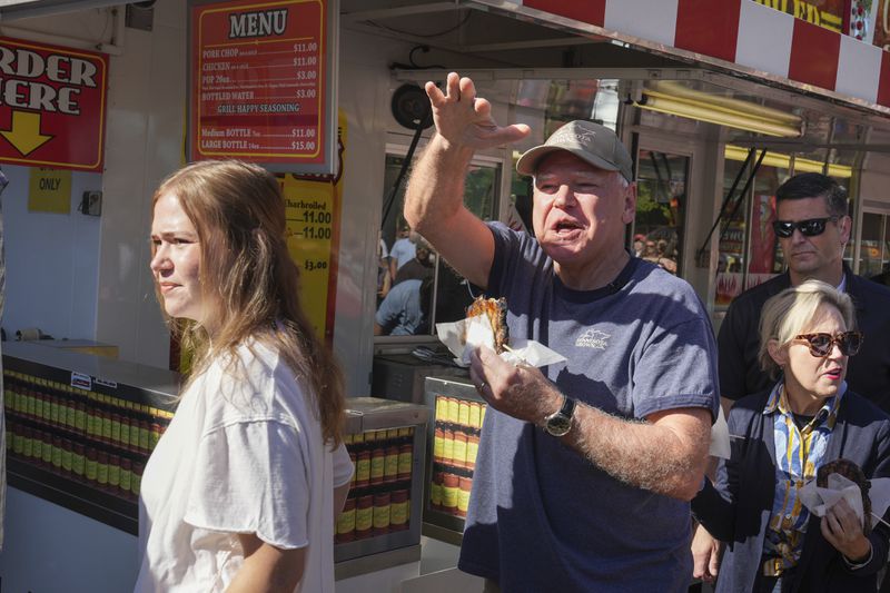 Democratic vice presidential candidate Minnesota Gov. Tim Walz visits the Minnesota State Fair Sunday, Sept. 1, 2024 in Falcon Heights, Minn. (Glen Stubbe /Star Tribune via AP)