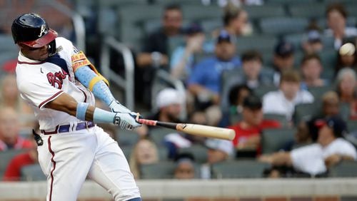 Braves outfielder Ronald Acuna connects on a home run off St. Louis Cardinals pitcher Kwang Hyun Kim in the third inning of the second game of a doubleheader on Sunday, June 20, 2021, at Truist Park in Atlanta. The Braves won 1-0. (Ben Margot/AP)