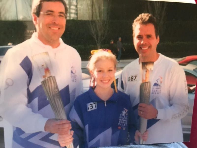 Fred Kalil (right) got to carry the Olympic torch during the 1996 Atlanta Olympics. CONTRIBUTED