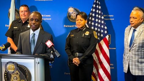 DeKalb County leaders held a news conference about gun safety Thursday morning, including CEO Michael Thurmond (left, speaking), police Chief Mirtha Ramos (center) and Public Safety Director Jack Lumpkin.
