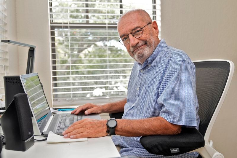 Lee Weiner poses for a photo in his apartment Monday, Aug. 12, 2024, in Dunedin, Fla. (AP Photo/Chris O'Meara)