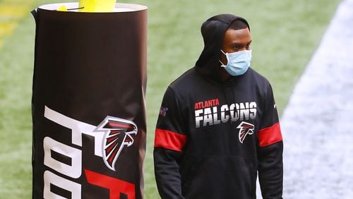 Falcons wide receiver Julio Jones, who is not playing in the game, watches from the end zone as his teammates prepare to play the Chicago Bears Sunday, Sept. 27, 2020, at Mercedes-Benz Stadium in Atlanta. (Curtis Compton / Curtis.Compton@ajc.com)