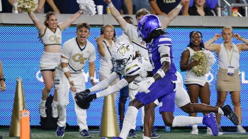 Georgia Tech Yellow Jackets wide receiver Eric Singleton Jr. (2) dives into the end zone to score a second-half touchdown during an NCAA football game between the Georgia State Panthers and Georgia Tech at Bobby Dodd Stadium in Atlanta on Saturday, Aug. 31, 2024. (Bob Andres for The Atlanta Journal-Constitution)