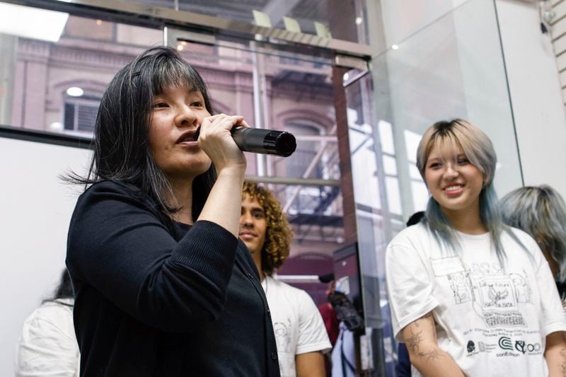 Beatrice Chen, executive director of Immigrant Social Services, speaks during the opening of an art contest titled "Hacked the Hate" made by young artists, Thursday, Aug. 8, 2024, in New York. (AP Photo/Kena Betancur)