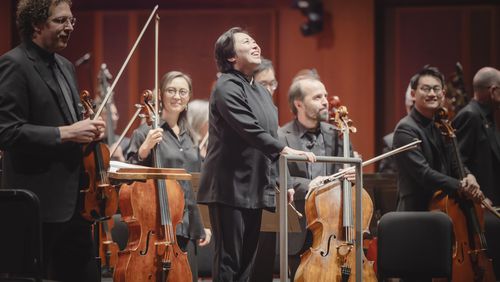 This image released by the Seattle Symphony Orchestra shows Xian Zhang, center, during a pre-concert performance at Benaroya Hall in Seattle on April 4, 2024. (Carlin Ma/Seattle Symphony Orchestra via AP)