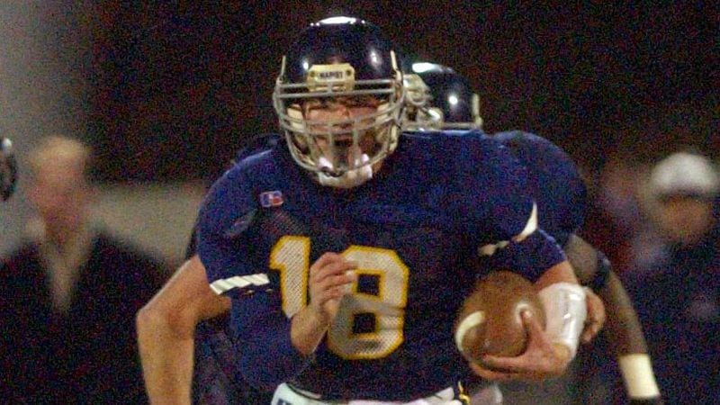 Marist quarterback Sean McVay takes off with the ball during the Class AAAA football championship game against Statesboro Dec. 19, 2003. Marist won 21-6.