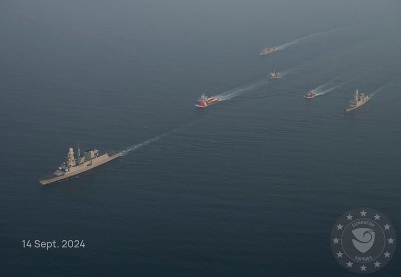 This photo released by the European Union’s Operation Aspides shows warships attached to the mission escorting salvage ships in the Red Sea on Saturday, Sept. 14, 2024. A new attempt has begun to try to salvage an oil tanker burning in the Red Sea after attacks by Yemen’s Houthi rebels, a European Union naval mission said Saturday. (European Union's Operation Aspides via AP)