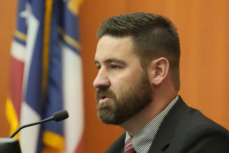 Detective Jeff O'Driscoll testifies during a hearing for Kouri Richins, a Utah mother of three who wrote a children's book about coping with grief after her husband's death and was later accused of fatally poisoning him Monday, Aug. 26, 2024, in Park City, Utah. (AP Photo/Rick Bowmer, Pool)