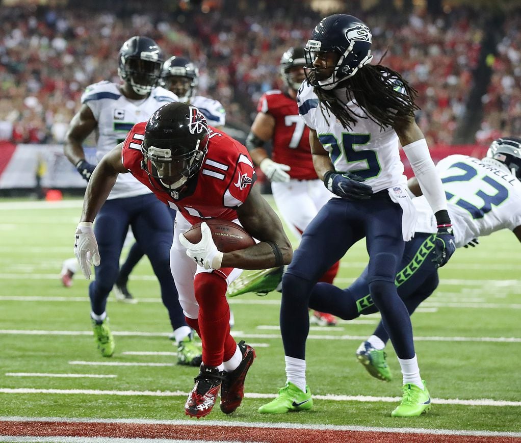 Atlanta Falcons cornerback Robert Alford (23) heads towards the locker room  at halftime of a game against the Los Angeles Rams played at the Los  Angeles Memorial Coliseum in Los Angeles on