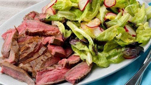 Broiled Flank Steak with Punchy Green Salad (Chris Hunt for The Atlanta Journal-Constitution)
