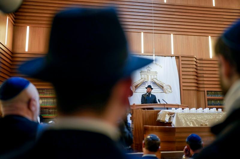 Rabi Yehuda Teichtal speaks at the synagogue of the Chabad community in Berlin, Germany, Monday, Oct. 7, 2024. (AP Photo/Markus Schreiber)