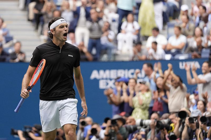 Taylor Fritz, of the United States, reacts in the third set against Jannik Sinner, of Italy, during the men's singles final of the U.S. Open tennis championships, Sunday, Sept. 8, 2024, in New York. (AP Photo/Julia Nikhinson)