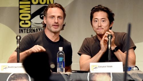 SAN DIEGO, CA - JULY 10: Actors Andrew Lincoln (L) and Steven Yeun speak onstage at AMC's "The Walking Dead" panel during Comic-Con International 2015 at the San Diego Convention Center on July 10, 2015 in San Diego, California. (Photo by Kevin Winter/Getty Images)