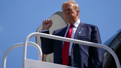 Republican presidential nominee former President Donald Trump arrives in Johnstown, Pa., en route to the Flight 93 Memorial, Wednesday, Sept. 11, 2024. (AP Photo/Matt Rourke)