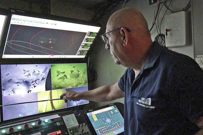 This photo released by Israel's Antiquities Authority (IAA) on Thursday, June 20, 2024 shows the control room of the Energean Star ship that mounted an operation to retrieve cargo that was carried on the world's oldest known deep-sea ship, as seen some 55.9 miles (90 kilometers off of the Israeli coastline. A company drilling for natural gas off the coast of northern Israel discovered a 3,300-year-old ship and its cargo, one of the oldest known examples of a ship sailing far from land, the Israel Antiquities Authority said on Thursday. (Emil Aladjem/ Israel Antiquities Authority via AP)