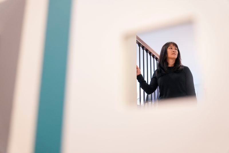 Ellen Lo Hoffman, the co-founder of Soul Reparations, a nonprofit providing free spiritual support to women, poses for a portrait at her home Wednesday, Aug. 21, 2024, in Bothell, Wash. (AP Photo/Lindsey Wasson)