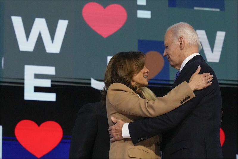 President Joe Biden embraces Democratic presidential nominee Vice President Kamala Harris during the first day of Democratic National Convention, Monday, Aug. 19, 2024, in Chicago. (AP Photo/Jacquelyn Martin)