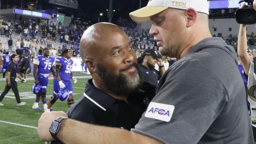 Georgia Tech Yellow Jackets coach Brent Key (right) talks to Georgia State Panthers coach Dell McGee after Tech's victory in an NCAA football game between Georgia State and Georgia Tech at Bobby Dodd Stadium in Atlanta on Saturday, Aug. 31, 2024. (Bob Andres for The Atlanta Journal-Constitution)