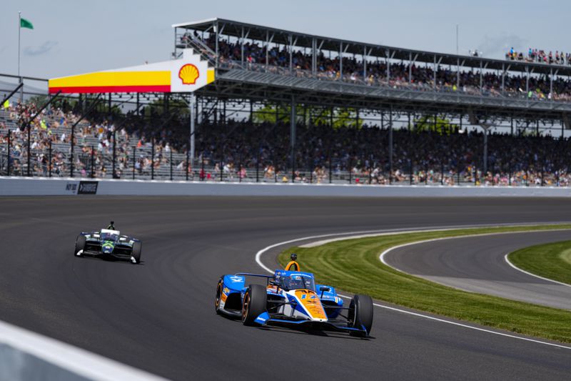 FILE - Kyle Larson drives through the first turn during the final practice for the Indianapolis 500 auto race at Indianapolis Motor Speedway in Indianapolis, Friday, May 24, 2024. (AP Photo/Michael Conroy, File)